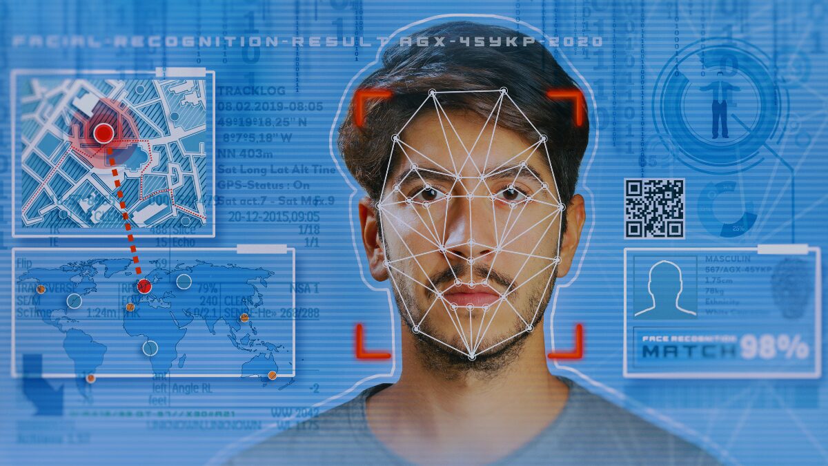 Man using biometric facial recognition technology at airport security check point