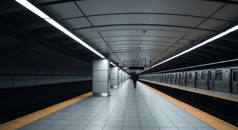 Modern, brightly lit subway platform in a newly constructed station in New York City