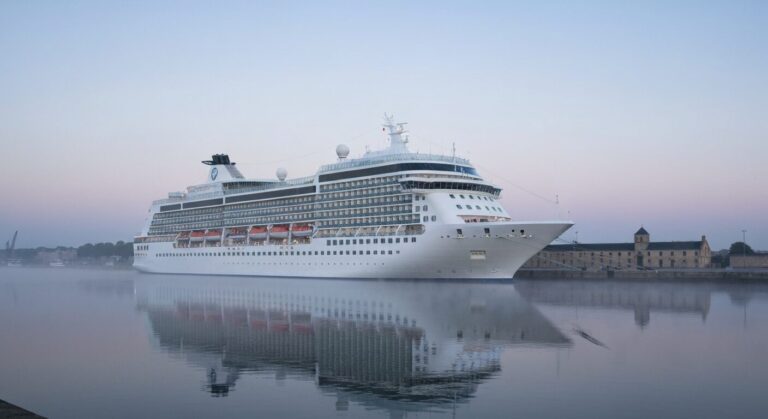 Ambassador Ambition cruise ship docked in Bordeaux port.